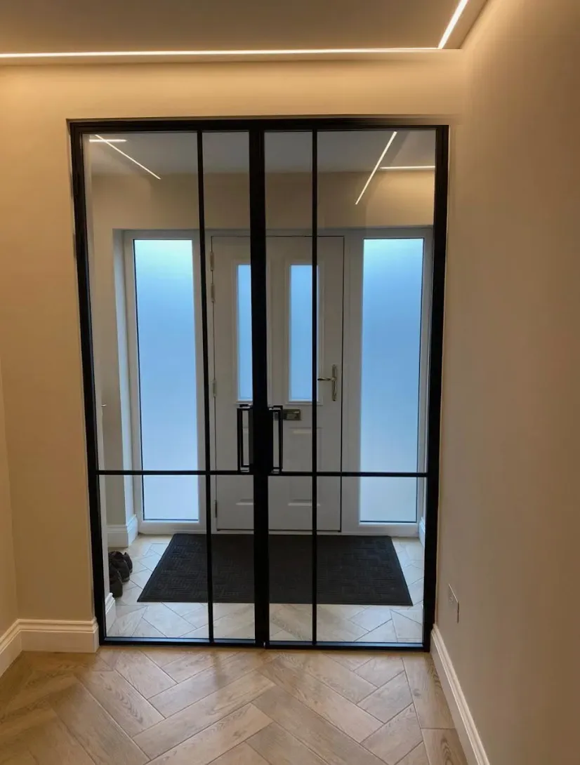 Paired steel and glass internal doors